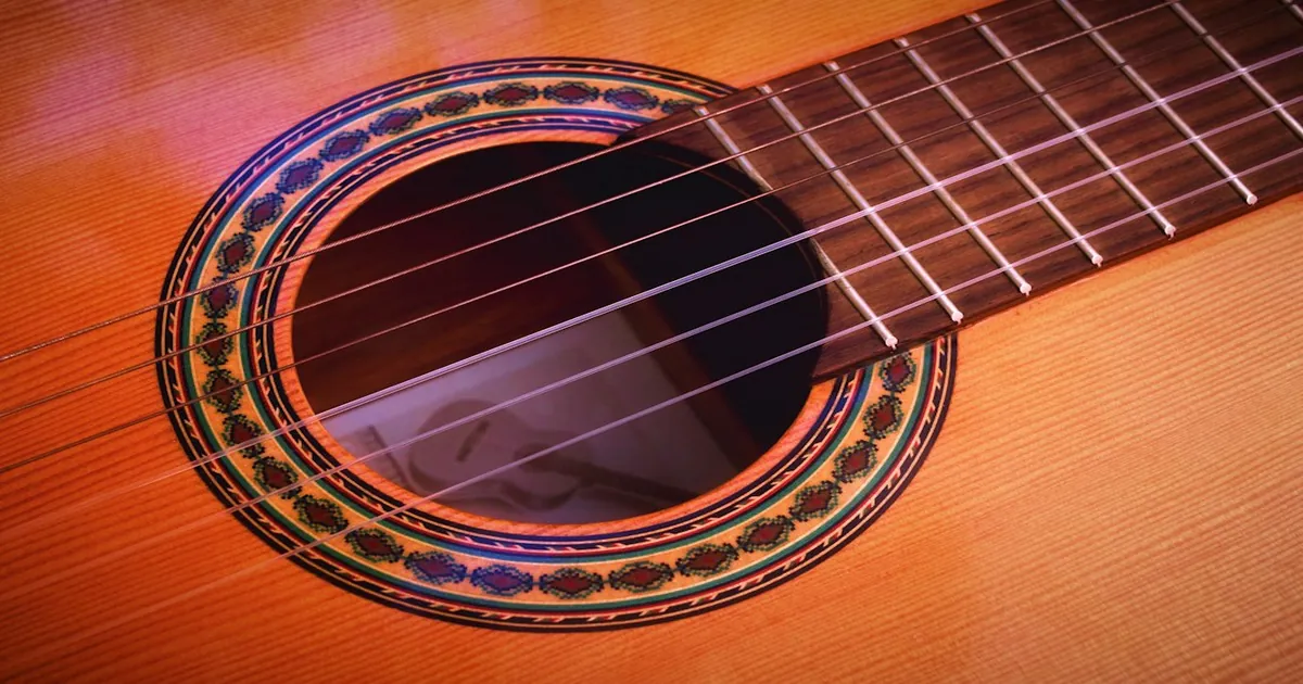 Acoustic Guitar Body Resonances: Plate Modes, Helmholtz Cavities, and the Physics of Tap Tuning